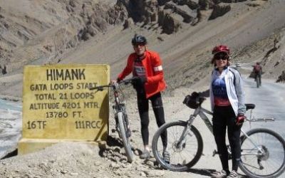 Aniki and Henk Cycling on the  tour with redspokes